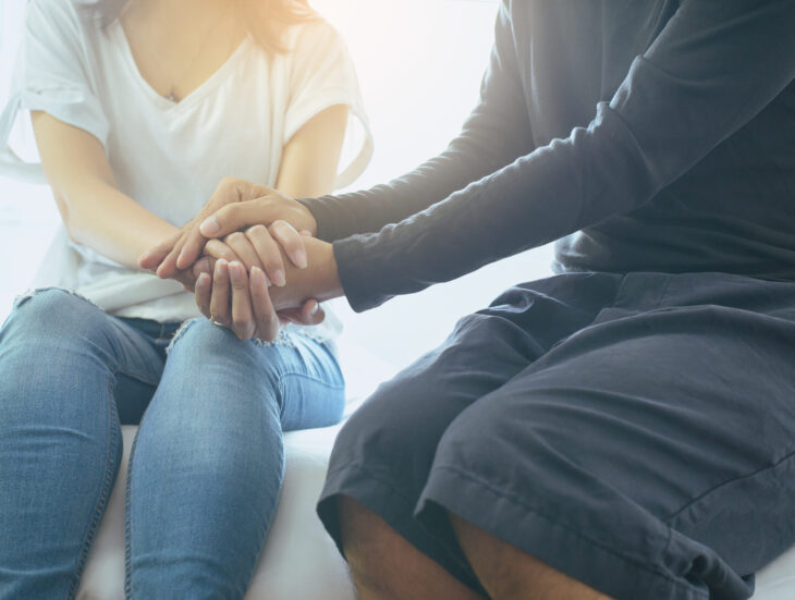 Man giving hand to depressed woman,Suicide prevention,Mental hea